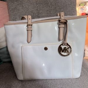 White a Michael Kors bag. Never used all tags still attached.